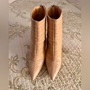 London Rebel pointed toe booties in tan croc.